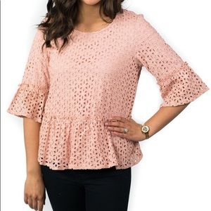 Eyelet ruffle hem top in pink